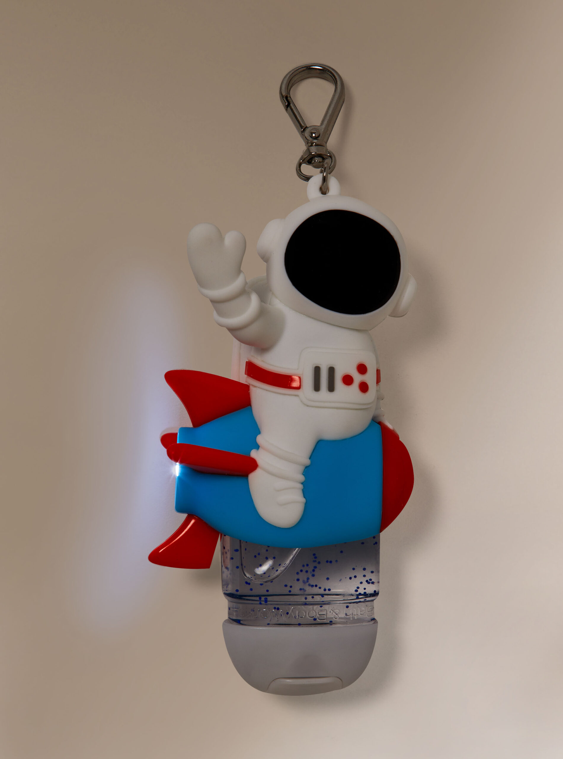 Light-Up Noise-making Astronaut and Rocket PocketBac Holder