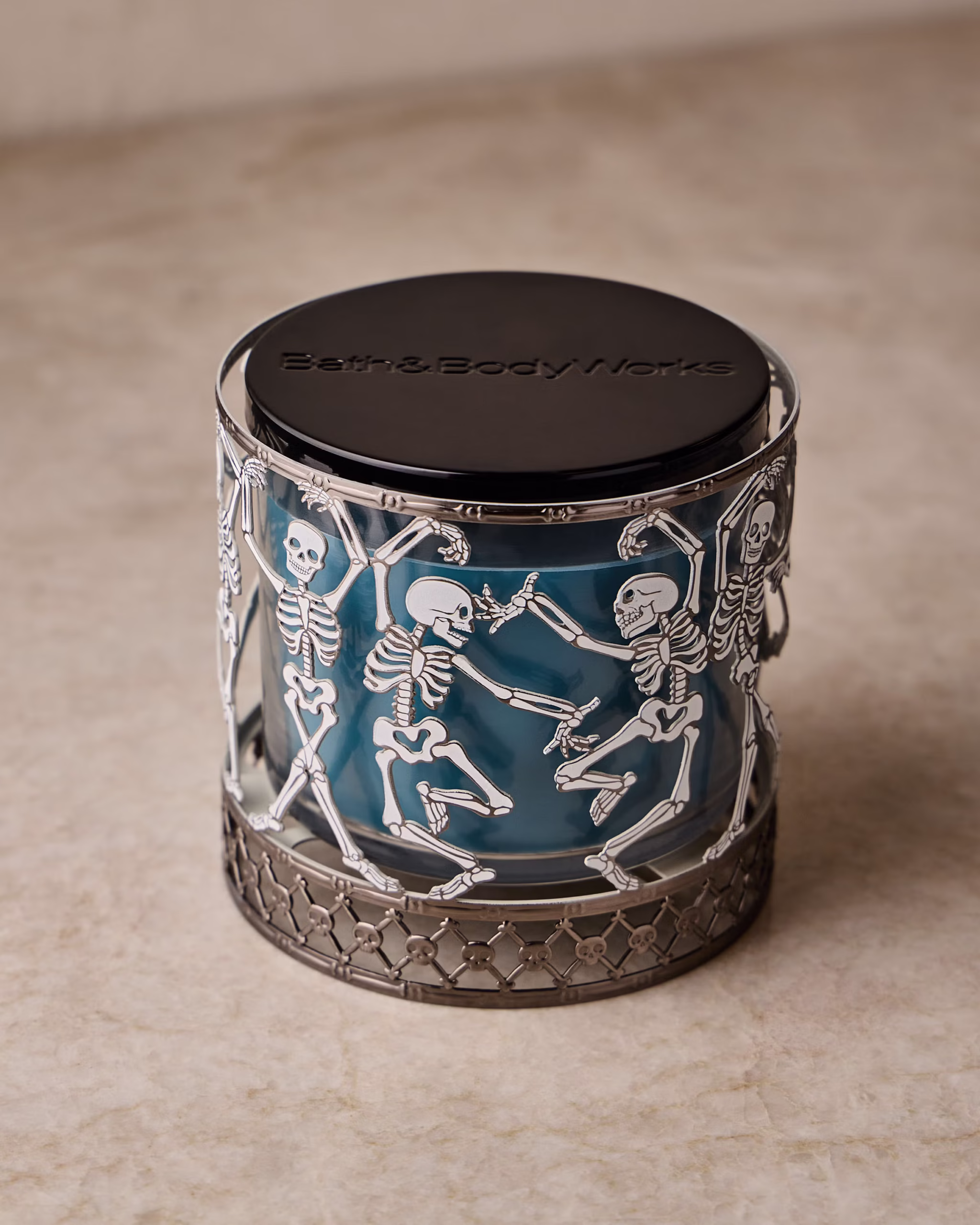 Glow-in-the-Dark Dancing Skeleton 3-Wick Candle Holder